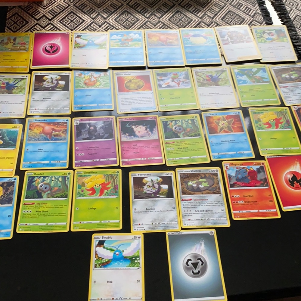 34 Pokémon cards new from package…. Never used